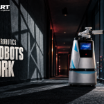 Excelland Robotics service robot delivering a parcel in a Hong Kong hotel corridor at night